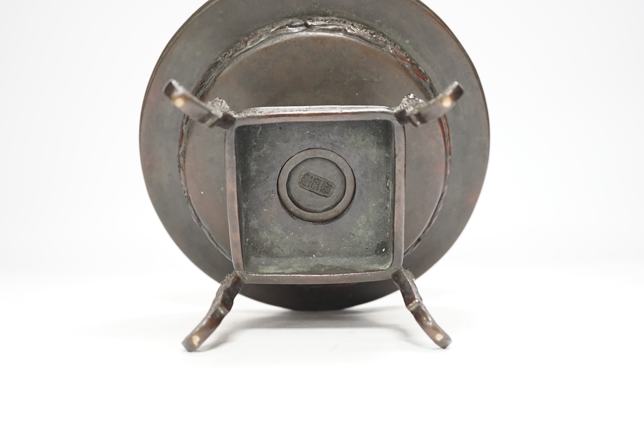 A Japanese bronze Ikebana vessel, 20cm in diameter
